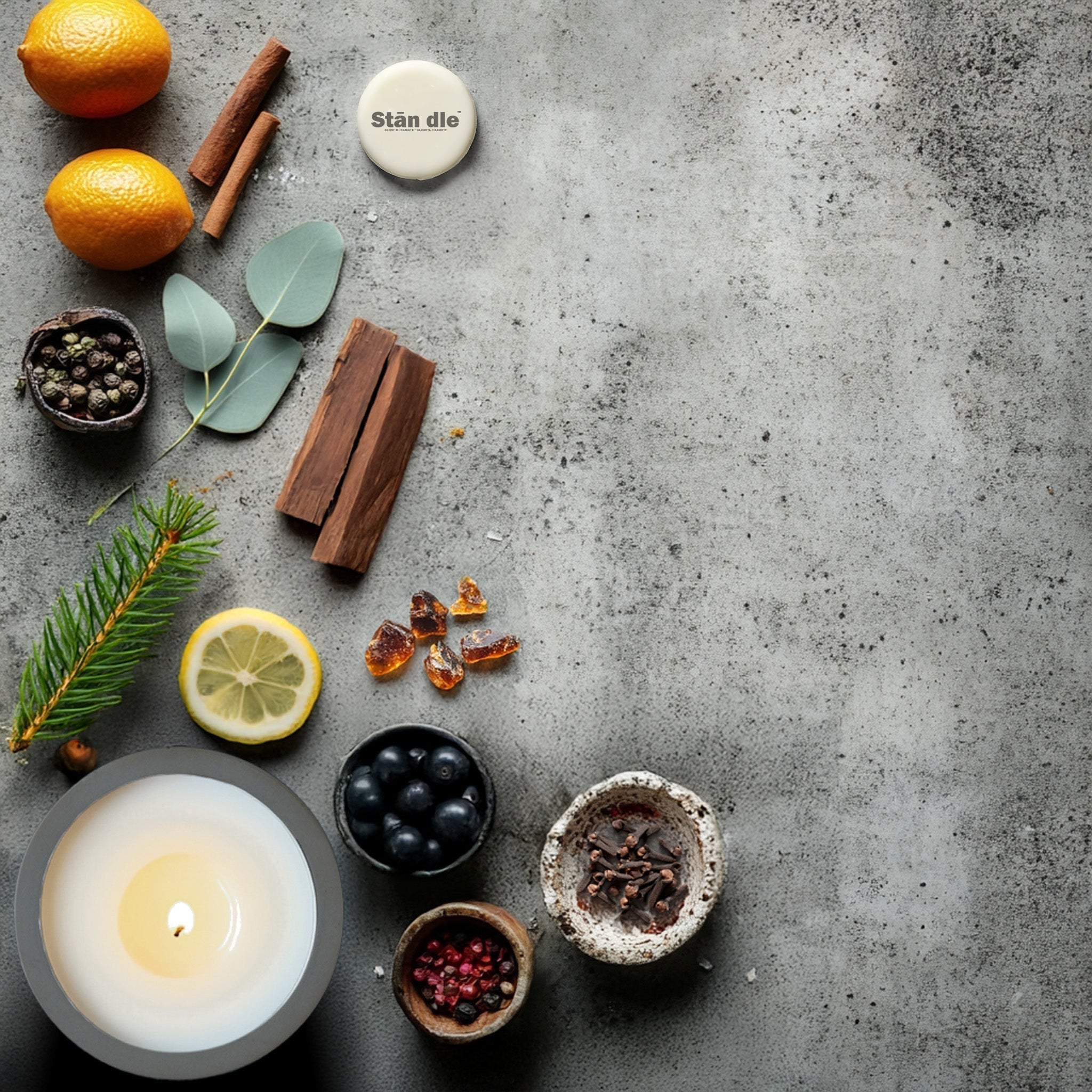 Calming fragrance ingredients arranged on stone — relaxing candle scents