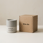 Lavendure 21 lavender soy candle beside Stān dle kraft packaging box