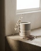 Lavendure 21 lavender soy candle on stone window sill with dried eucalyptus and lavender
