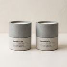 Stān dle candle duo — Sandalure 18 sandalwood and Lavendure 21 lavender soy candles in concrete vessels